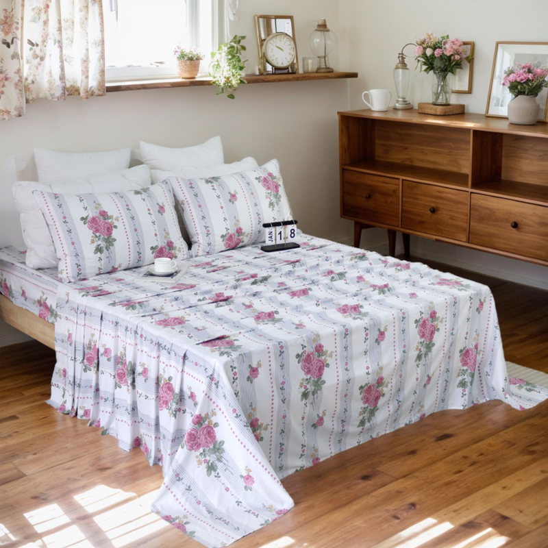 This bedroom features FADFAY's flat sheet, fitted sheet, and pillowcases.