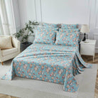 This bedroom features FADFAY's flat sheet, fitted sheet, and pillowcases.