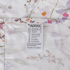 Floral fabric with FADFAY label showing care instructions