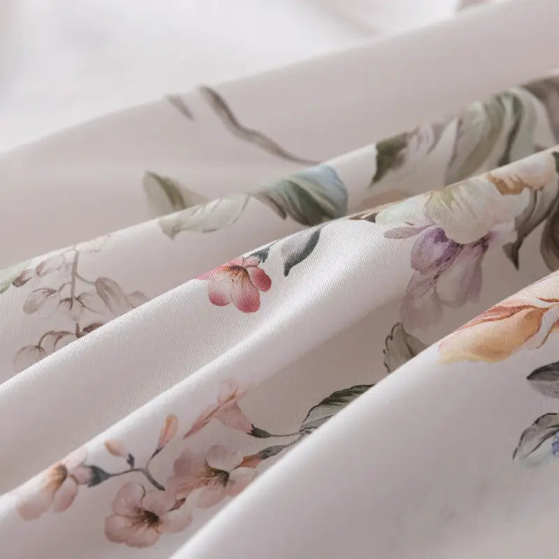 Fabric label with care instructions on a red floral patterned fabric