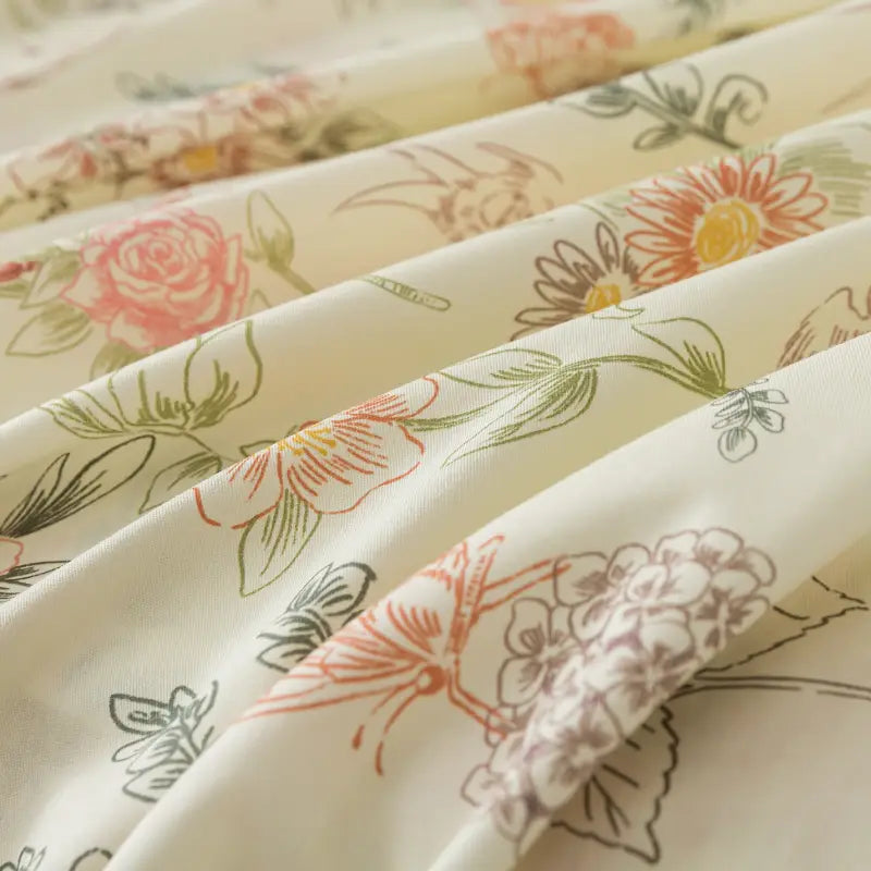 Fabric label with care instructions on a red floral patterned fabric