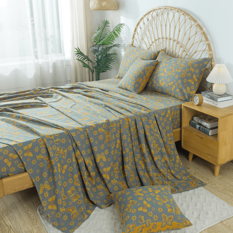 This bedroom features FADFAY's flat sheet, fitted sheet, and pillowcases.